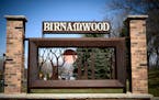 The entrance sign to the Birnamwood neighborhood as seen from along from Parkwood Drive in Burnsville.