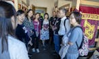 Pai Liu, left, led a group from China on a tour during orientation for parents of incoming U freshmen last summer.