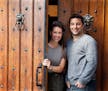 Owners Eric and Vanessa Carrara at the front door of the Italian Eatery.