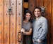 Owners Eric and Vanessa Carrara at the front door of the Italian Eatery.