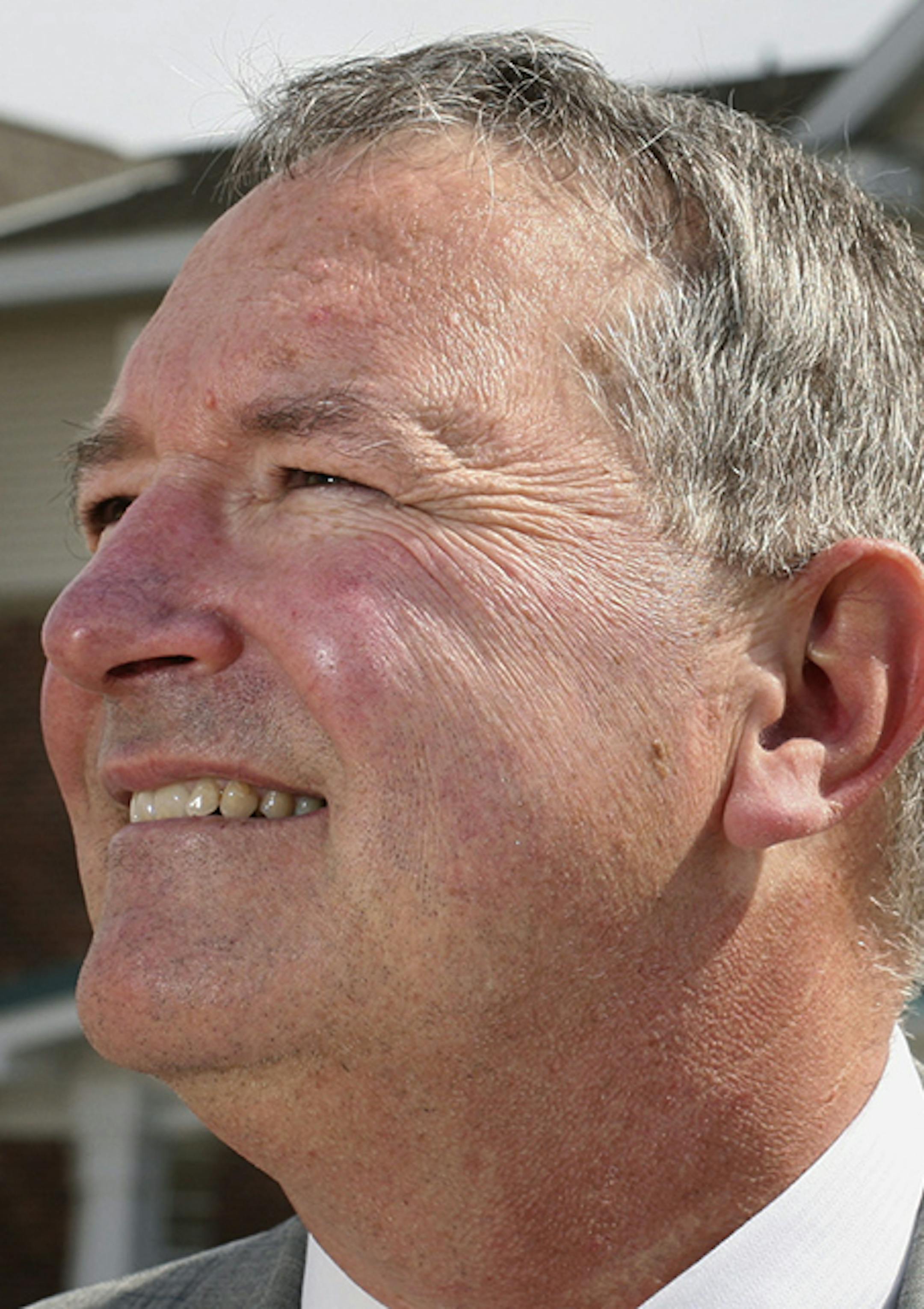Dakota County Community Development Agency executive director Mark Ulfers show in front of Lakeside Pointe, one of the agency's senior housing developments in Eagan. ] GENERAL INFORMATION: JENNIFER SIMONSON ‘ jsimonson@startribune.com Eagan, MN-Thurs., Apr. 13, 2005 A mini-profile of Mark Ulfers, director of the Dakota County Community Development Agency. ORG XMIT: MIN2015031817061256