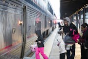 Passengers board the Empire Builder to Chicago at St. Paul's Union Station on Friday. After a drop in 2015, ridership on Amtrak's Minnesota route surg