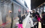 Passengers board the Empire Builder to Chicago at St. Paul's Union Station on Friday. After a drop in 2015, ridership on Amtrak's Minnesota route surg