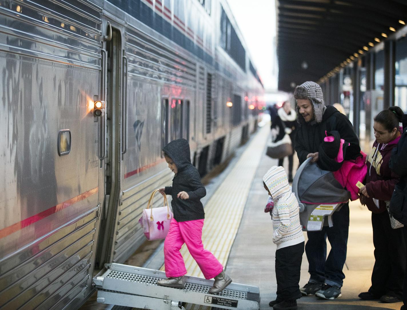 Passengers board the Empire Builder to Chicago at St. Paul's Union Station on Friday. After a drop in 2015, ridership on Amtrak's Minnesota route surged 3.7 percent in 2016.