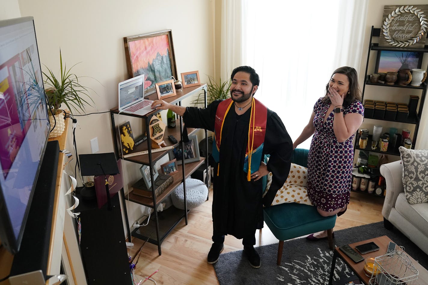 Izaak Mendoza navigated to the video commencement address in his graduation robes alongside his wife, Becky, and his family, who were on a video call from their home in Wyoming on Saturday.