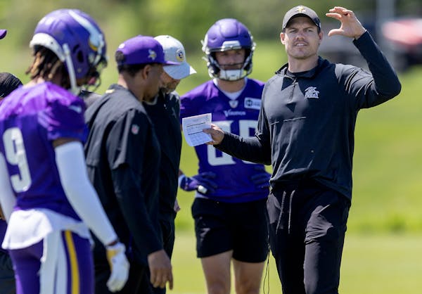 Vikings head coach Kevin O’Connell, right, will lead his first NFL training camp beginning in late July.