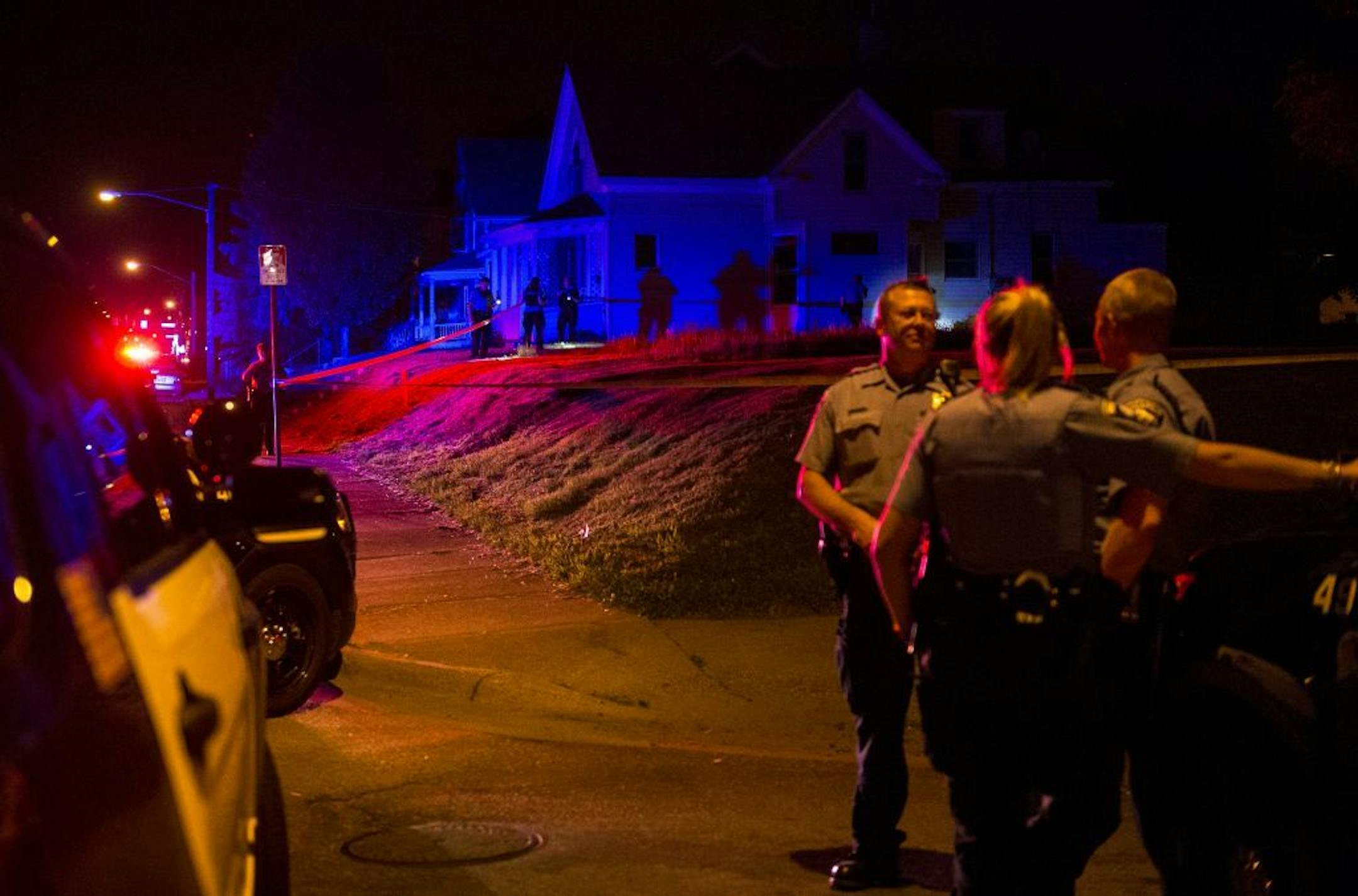 Police investigate a fatal shooting at Penn Avenue North and North 21st Avenue on Thursday, May 26, 2016 in Minneapolis, Minn.