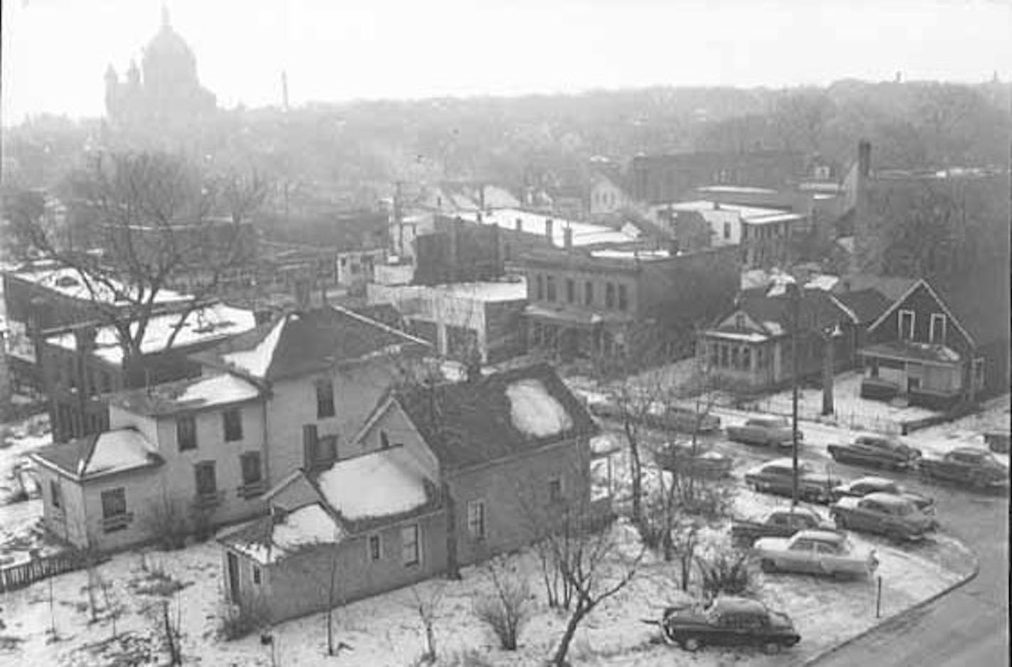 Another photo shows a view from the State Office Building toward the Cathedral in 1953, with some housing still standing in the area. (Minnesota Historical Society)