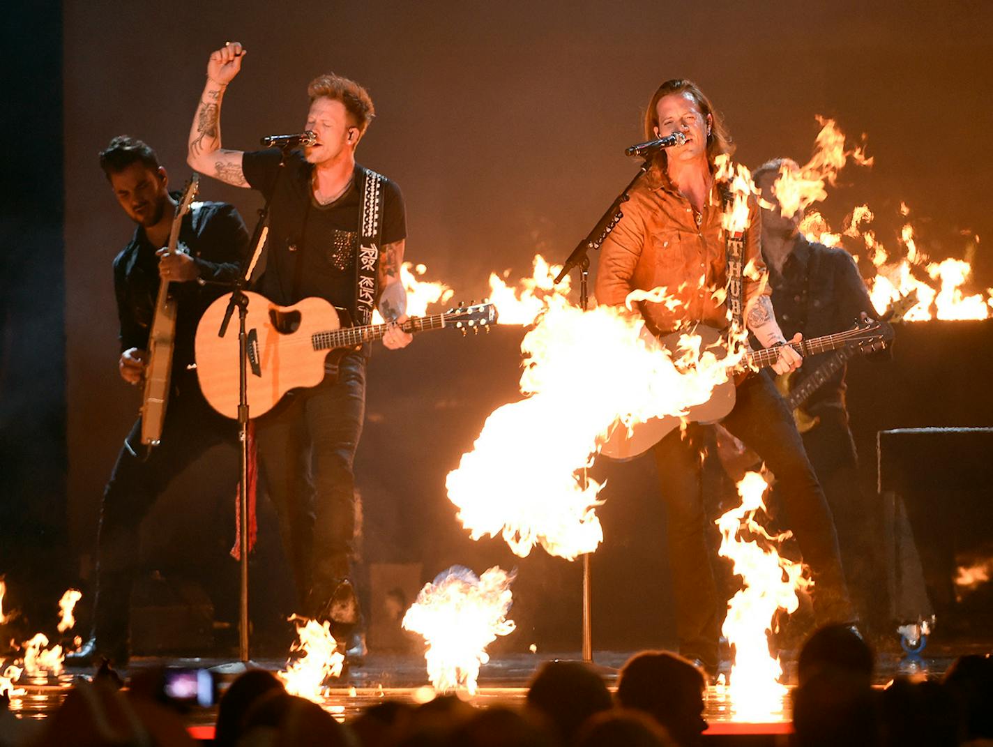 Brian Kelley, left, and Tyler Hubbard, of Florida Georgia Line, perform at the 50th annual Academy of Country Music Awards at AT&T Stadium on Sunday, April 19, 2015, in Arlington, Texas.