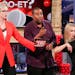 "Hollywood Game Night" host Jane Lynch with "Red Nose Day" participants Kenan Thompson and Kristen Bell.