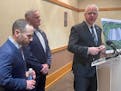 Gov. Tim Walz speaks at a news conference about the new Meta data center in Rosemount with Brad Davis, director of data center community development f