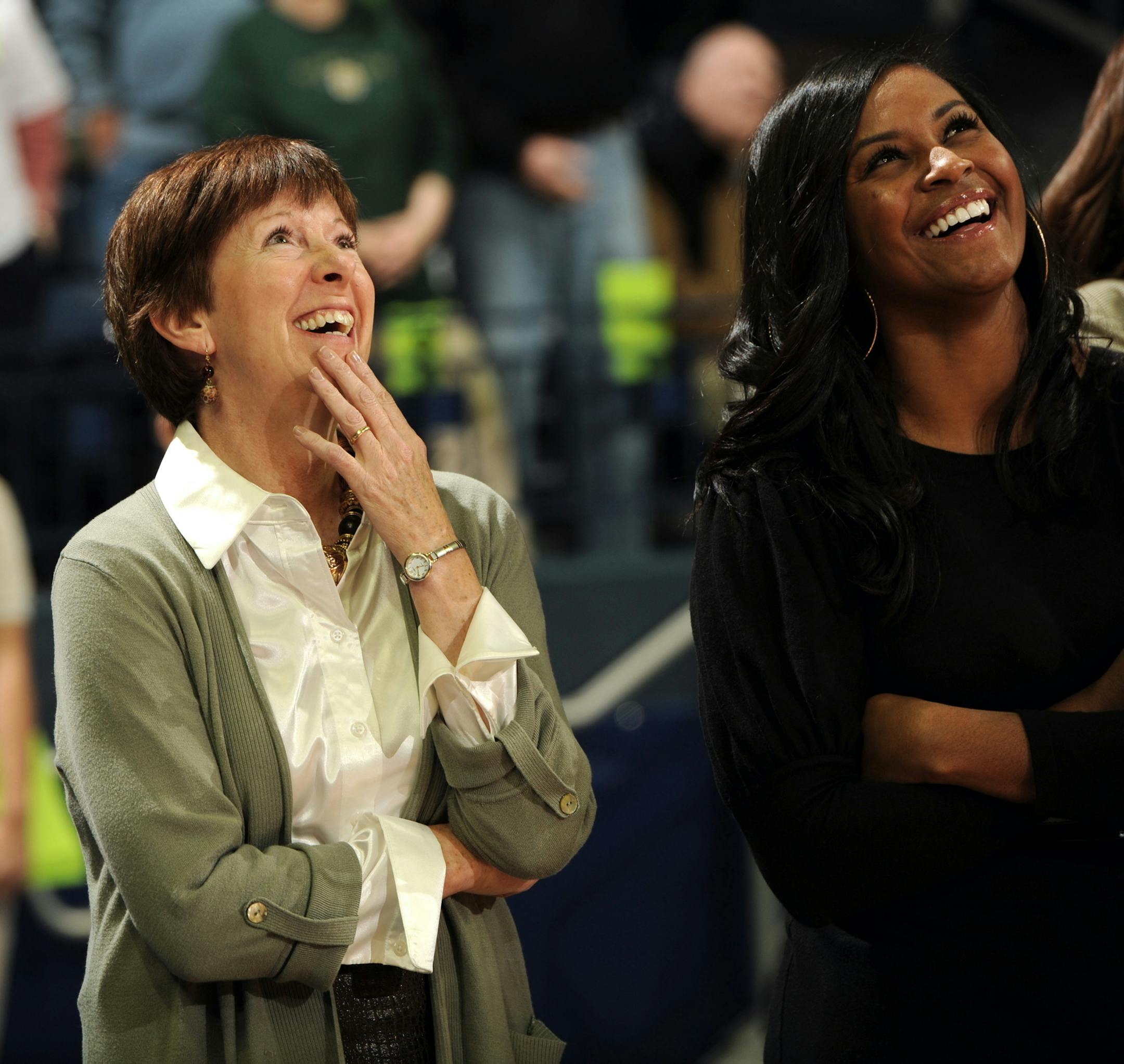 Notre Dame assistant coach Niele Ivey, right.