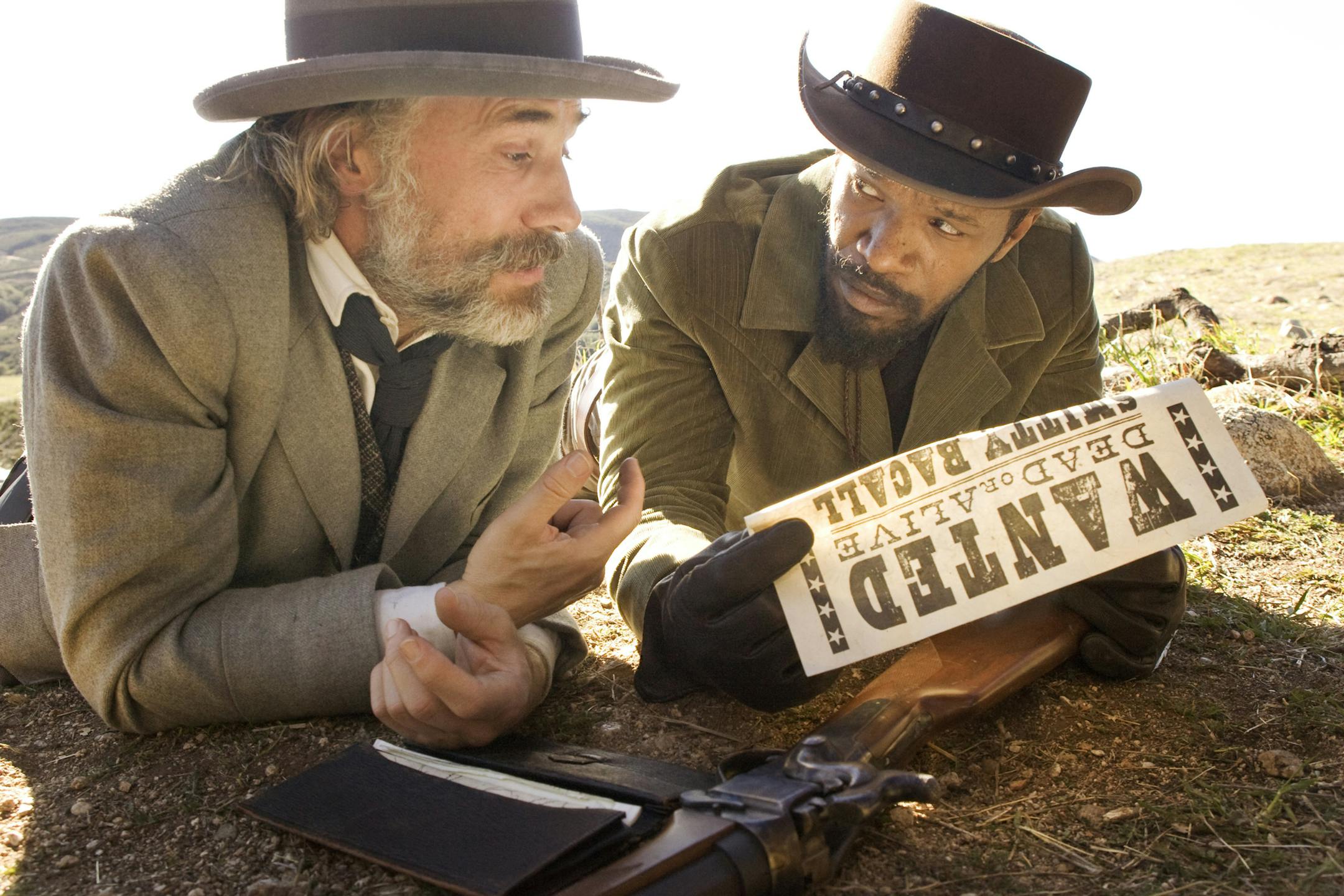 FILE - This undated publicity image released by The Weinstein Company shows, from left, Christoph Waltz as Schultz and Jamie Foxx as Django in "Django Unchained," directed by Quentin Tarantino. In Los Angeles, the Weinstein Co. canceled Tuesday, Dec. 18, 2012, planned premiere of the violent movie "Django Unchained." (AP Photo/The Weinstein Company, Andrew Cooper, SMPSP, File) ORG XMIT: MIN2012122417512627