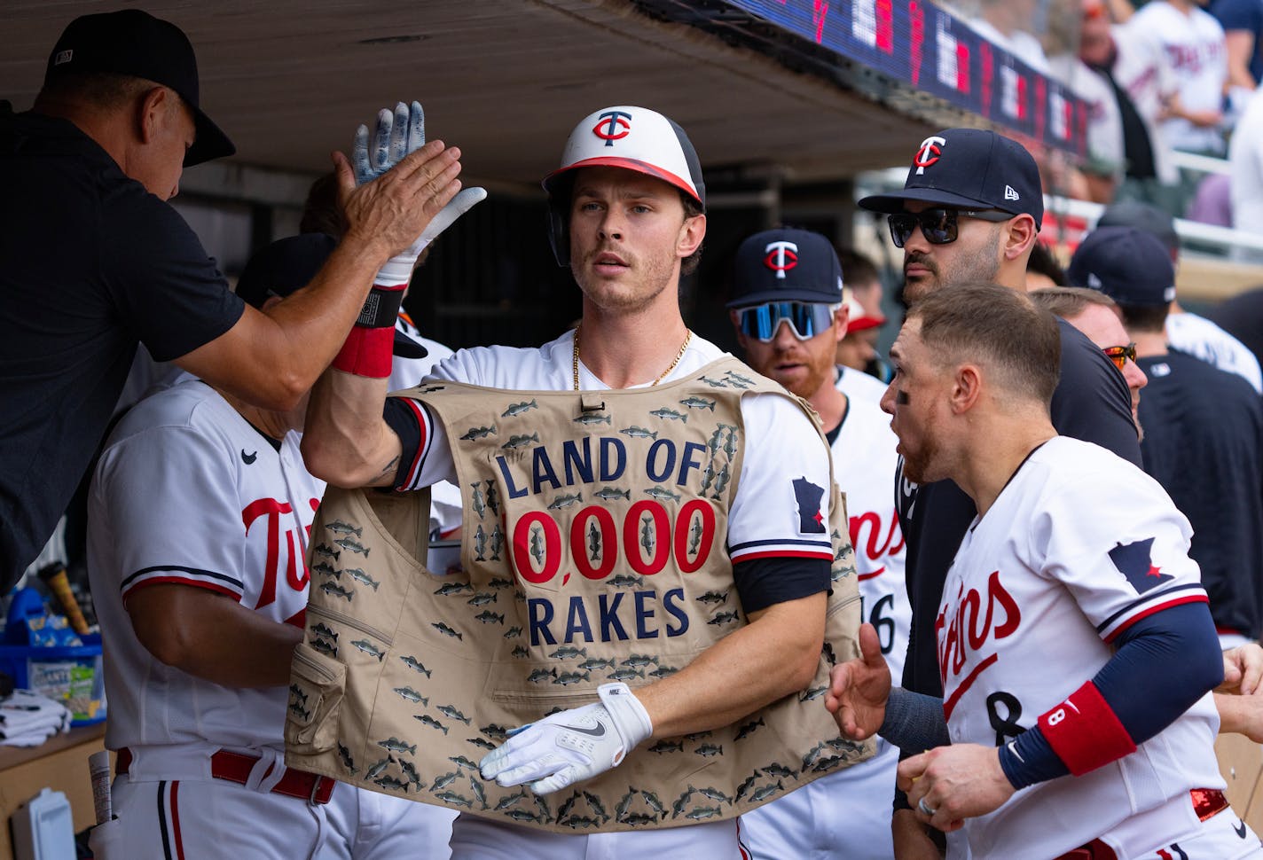 Minnesota Twins right fielder Max Kepler (26) celebrates after hitting a solo home run against the Detroit Tigers in the ninth inning Wednesday, Aug. 16, 2023, at Target Field in Minneapolis. ]