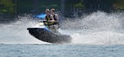 Personal watercraft riders spotted Wednesday afternoon on White Bear Lake had fun responsibly.