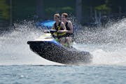 Personal watercraft riders spotted Wednesday afternoon on White Bear Lake had fun responsibly.