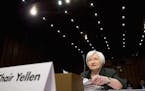 FILE - In this Thursday, Dec. 3, 2015, file photo, Federal Reserve Chair Janet Yellen prepares to testify on Capitol Hill in Washington, before the Jo