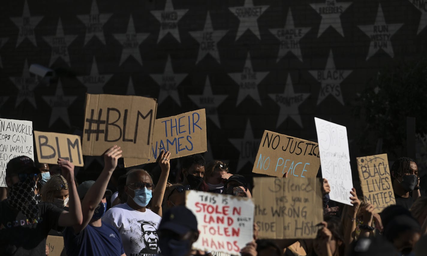 Protesers marched past First Avenue Saturday night. ] aaron.lavinsky@startribune.com The 10k March for a "Free North" began outside US Bank Stadium, marching over the Hennepin Avenue Bridge, on Saturday, June 13, 2020 in Minneapolis, Minn. ORG XMIT: MIN2006132116440468