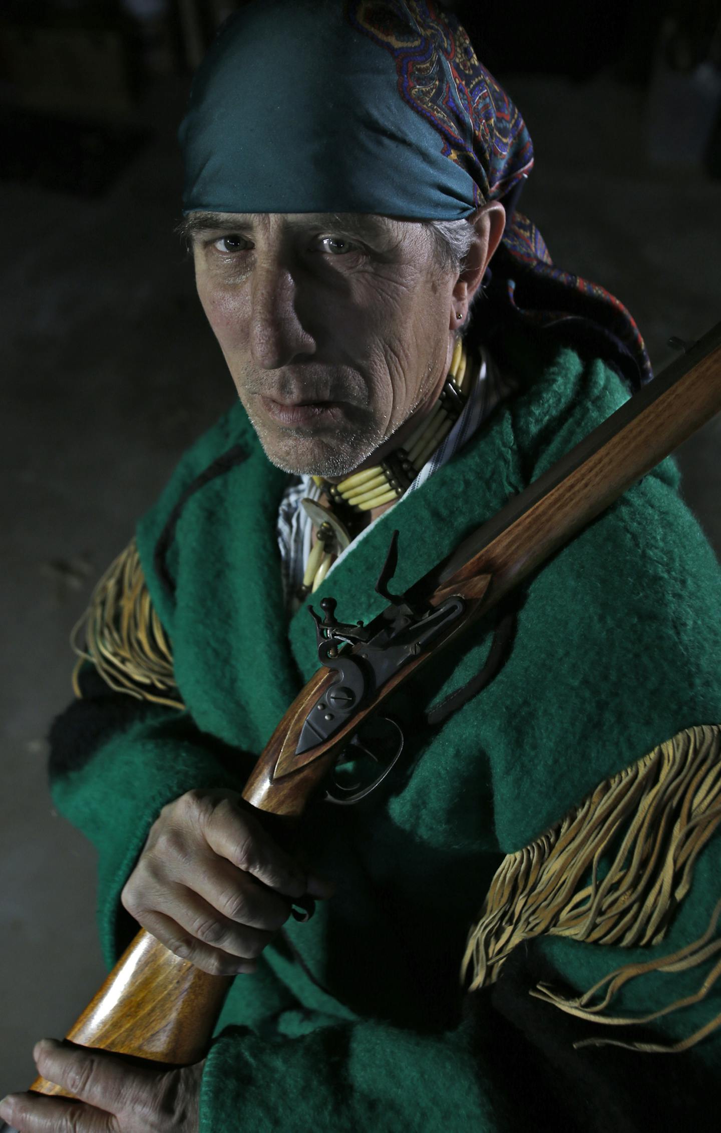 Muzzleloader enthusiast Jim Townsend of Andover wearing early 1800's era hunting clothing carries a southern mountain rifle. (MARLIN LEVISON/STARTRIBUNE(mlevison@startribune.com)