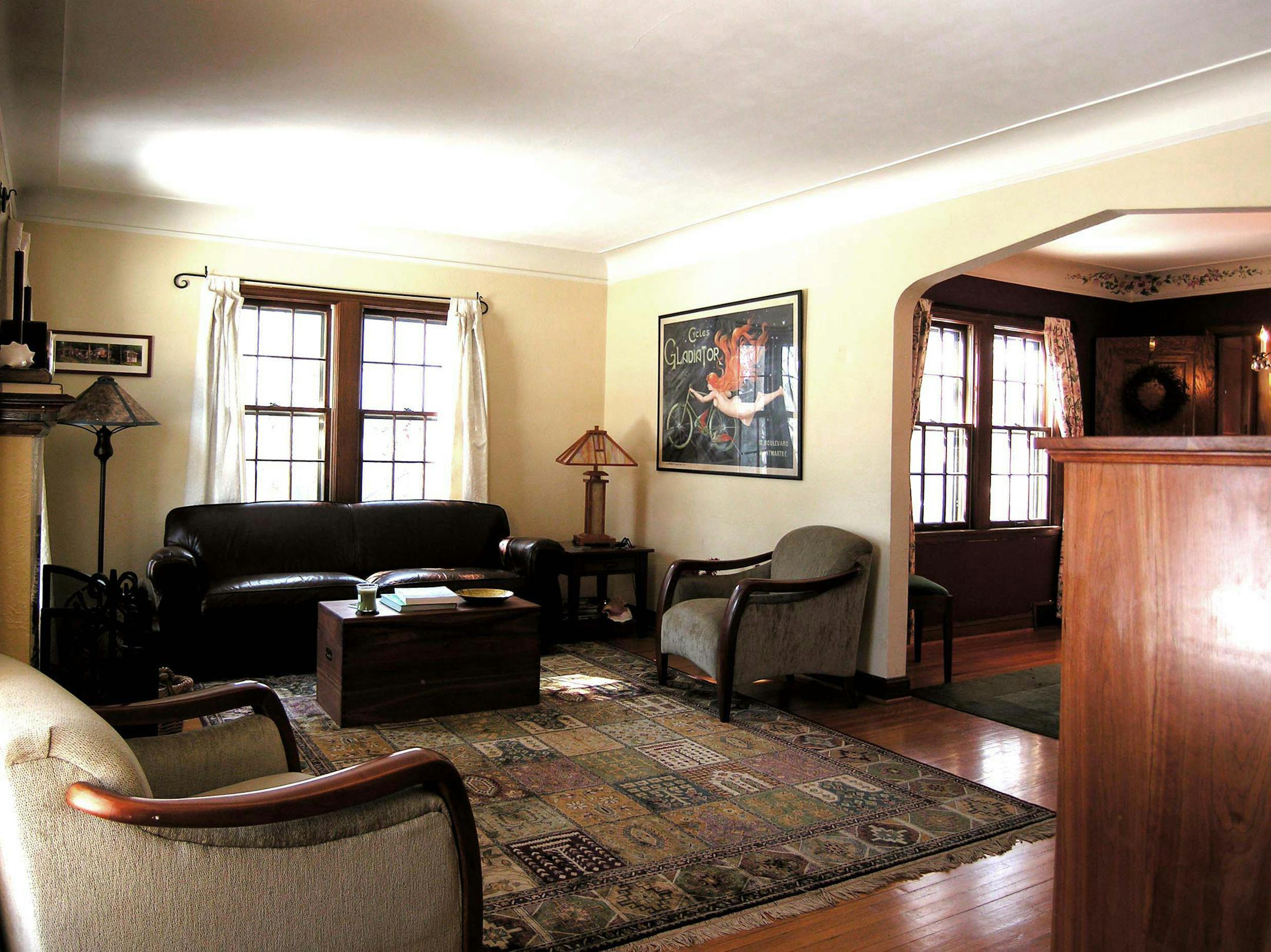 Before: The heavy area rug and too much furniture hid the room's selling points.