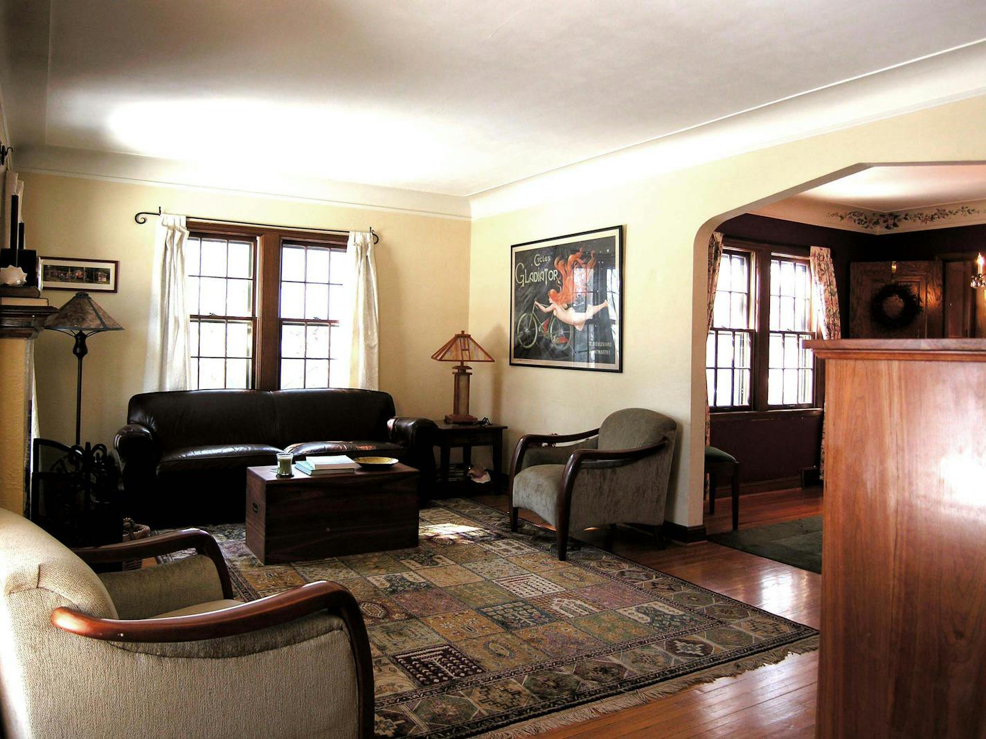 Before: The heavy area rug and too much furniture hid the room's selling points.