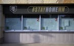 The Twins Box Office was shuttered Thursday evening, as a #STAYHOMEMN sign was digitally displayed above.