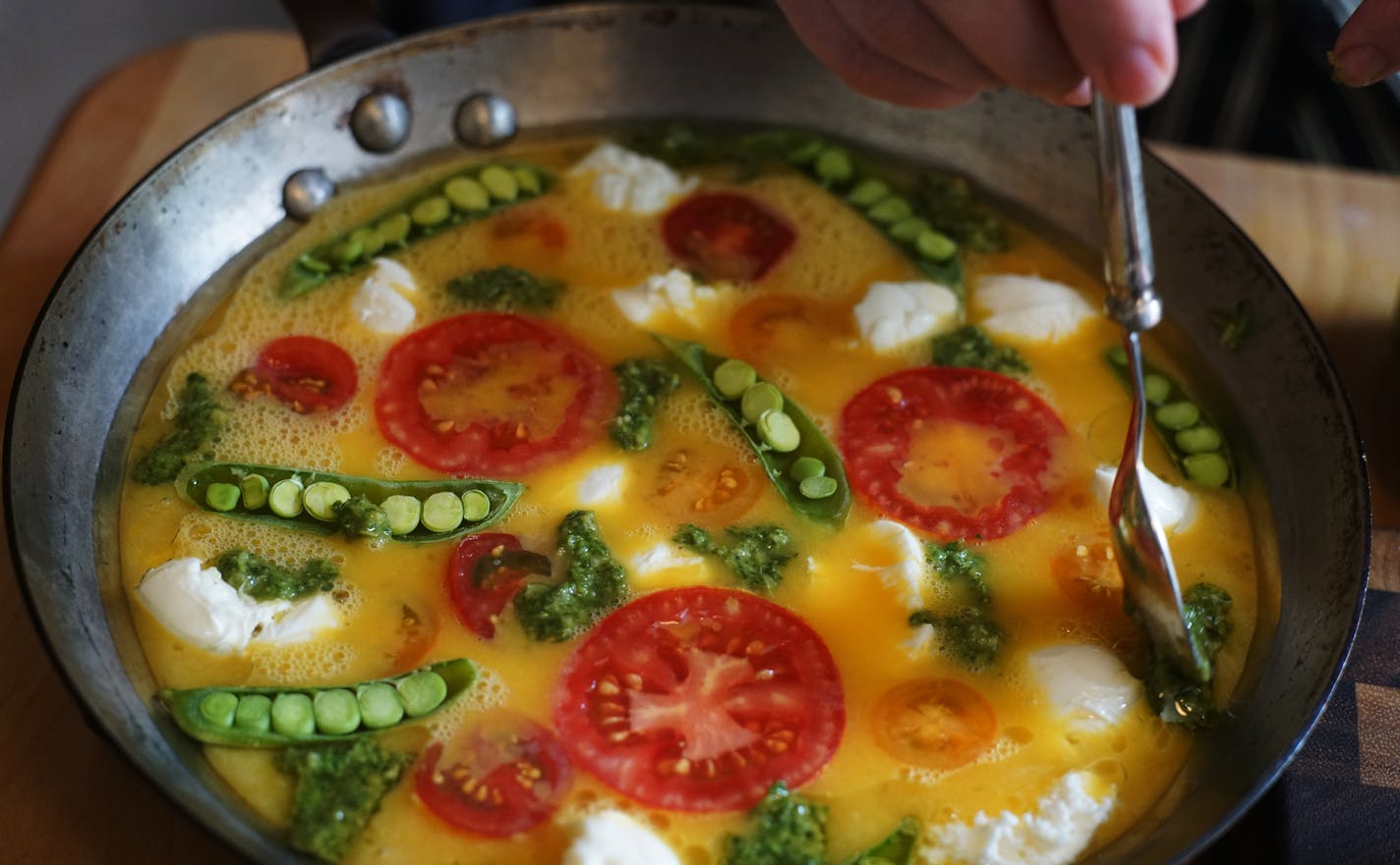 Stephanie A. Meyer prepares an egg frittata with tomatoes, snap peas, pesto, mozzarella, and garlic chives.] When Stephanie A. Meyer writes a grocery list, she's not just planning meals for herself and her boyfriend. She's coming up with a plan that hundreds of people around the world pay to get by email each week. Richard Tsong-Taatarii&#xef;rtsongtaatarii@startribune.com