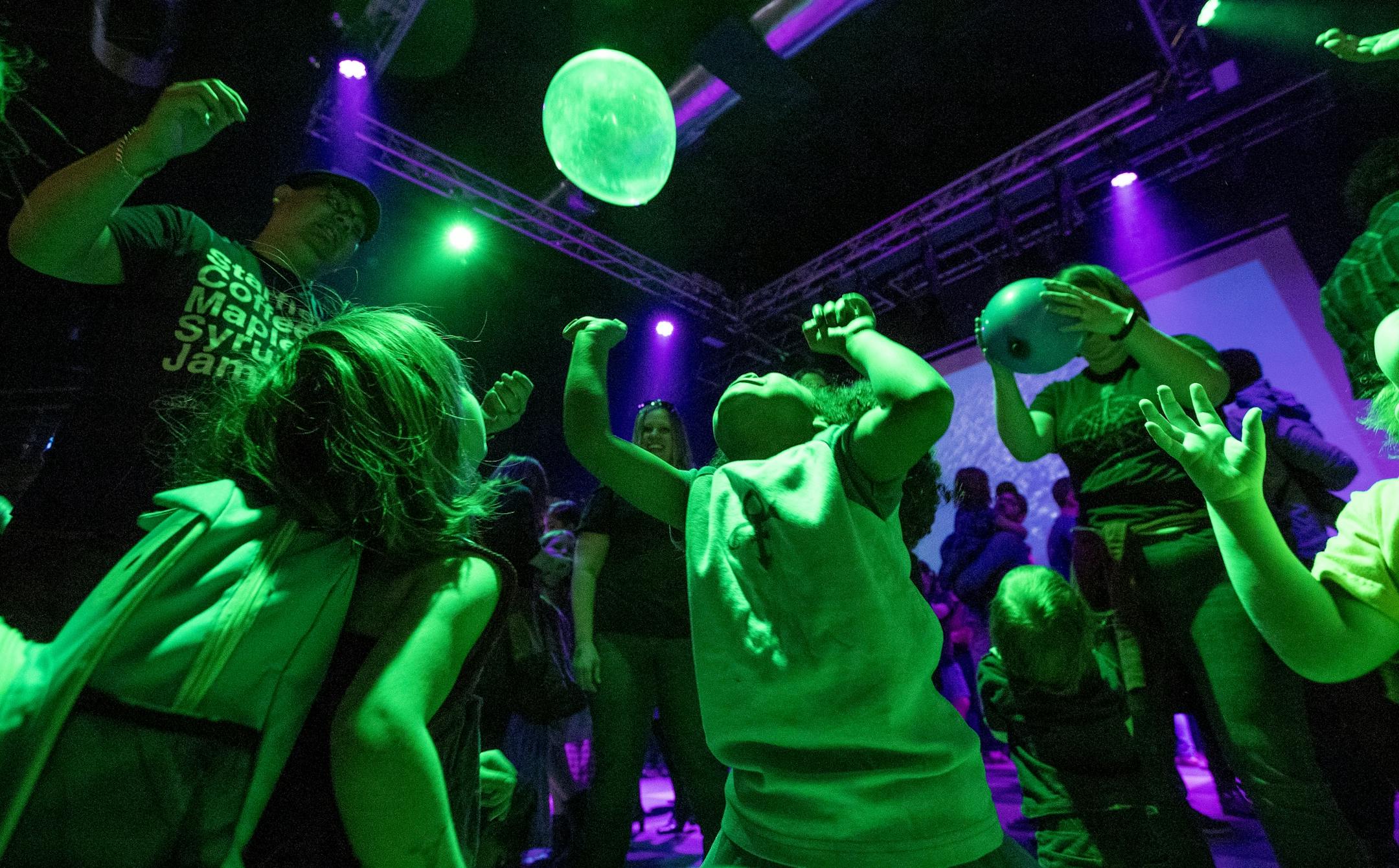 Kids danced and played with balloons at the I Would Dance 4 You party at First Avenue.