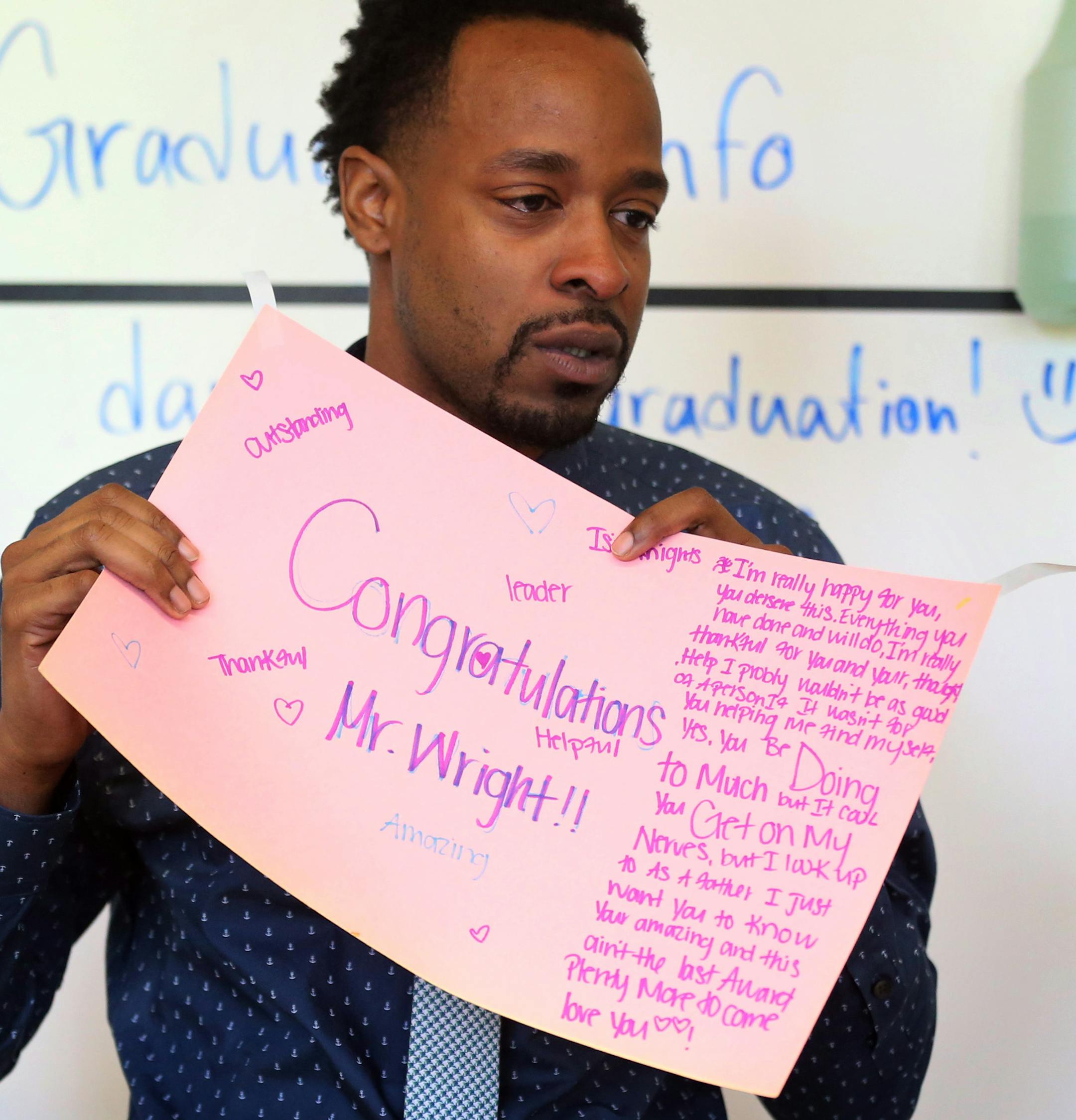 An emotional Abdul Wright wiped tears from his eyes after reading a congratulation letter given to him from his students after he returned to his school after winning the 2016 Minnesota Teacher of at the Best Academy Charter School Monday May 16, 2016 in Minneapolis, MN.] Jerry Holt /Jerry.Holt@Startribune.comas