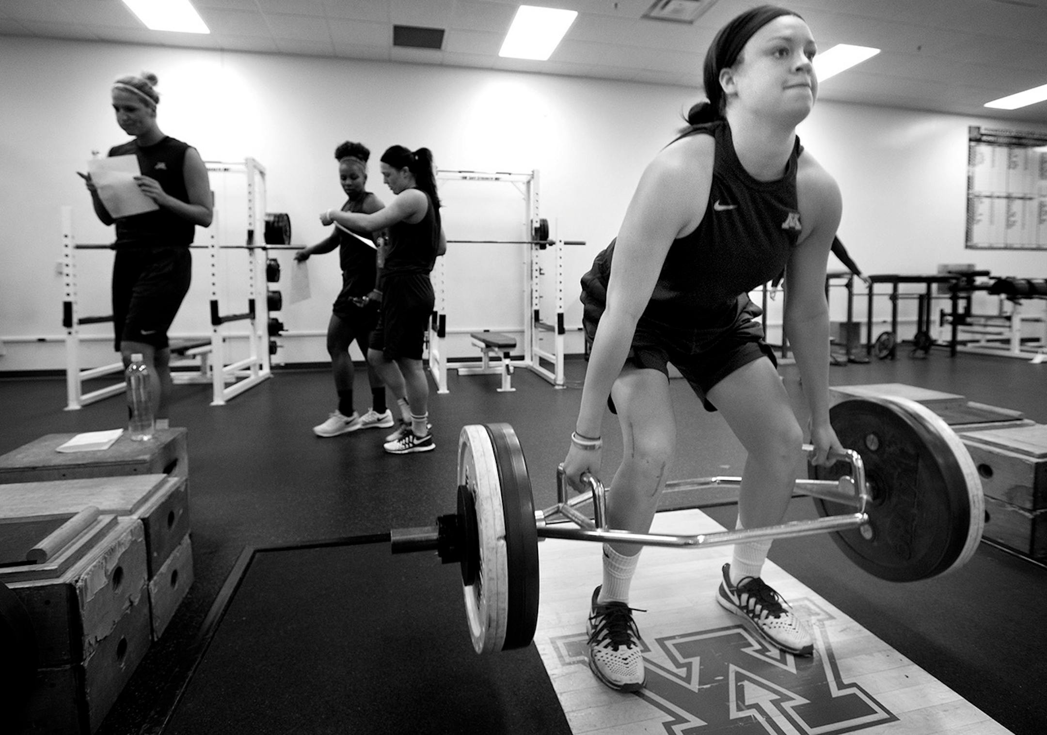 Rachel Banham worked out in the weight room separately from teammates as she rehabbed her knee injury on April 29, 2015. Although the injury happened during her senior year Banham received a medical hardship waiver to return for 2015-16 season.