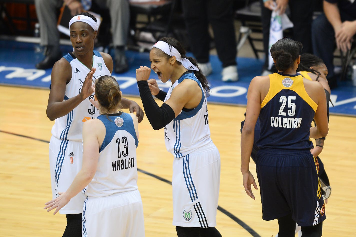 Lynx forward Maya Moore (23) celebrated with guard Lindsay Whalen (13) and center Sylvia Fowles (34) during the WNBA Finals in October.