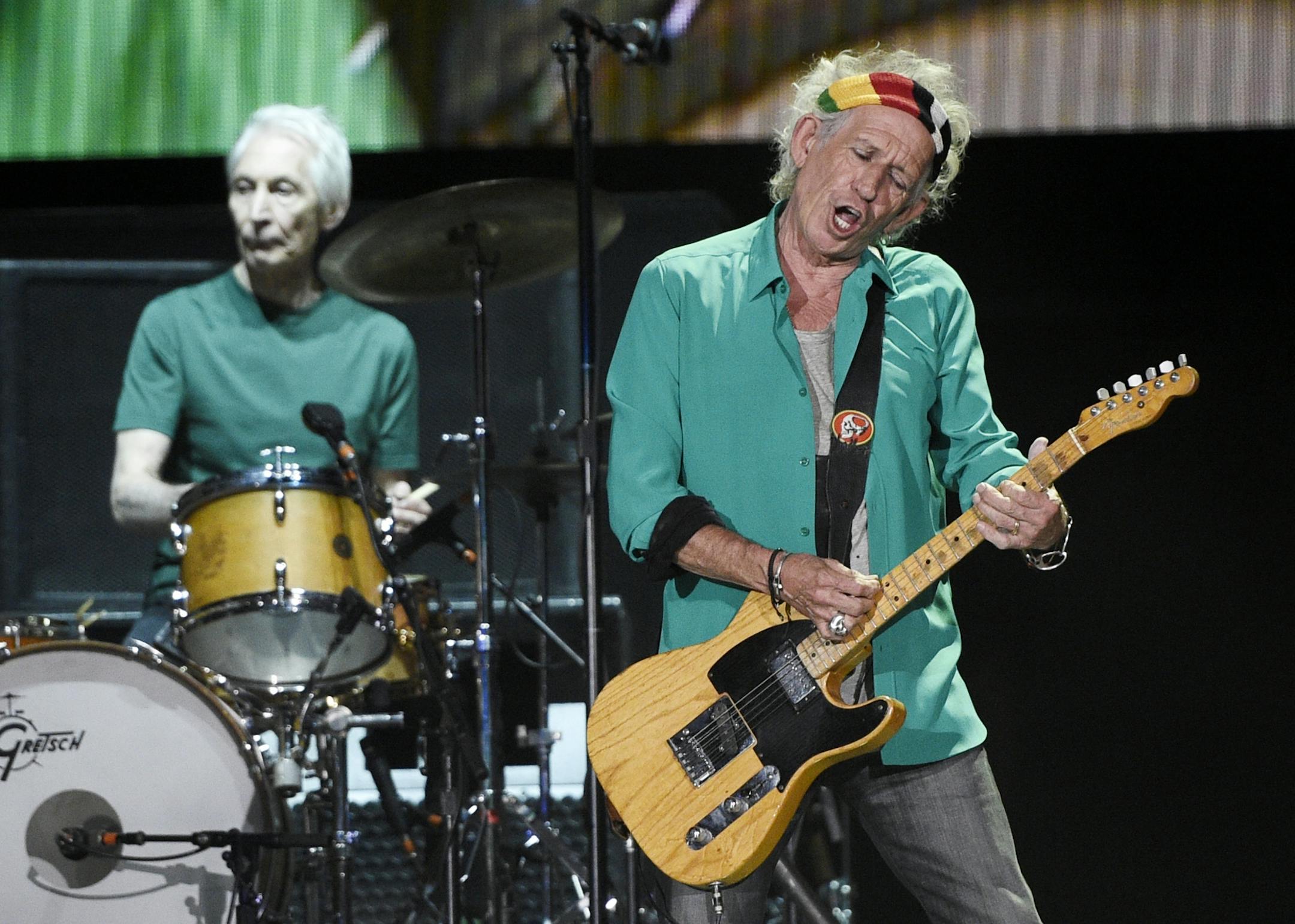 Keith Richards, right, of The Rolling Stones performs along with drummer Charlie Watts during the band's performance on day 1 of the 2016 Desert Trip music festival at Empire Polo Field on Friday, Oct. 7, 2016, in Indio, Calif.