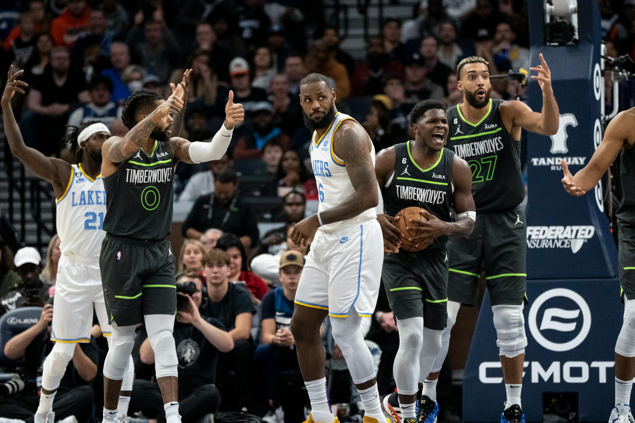 Minnesota Timberwolves players complain after a foul was called on Minnesota Timberwolves forward Anthony Edwards (1) against Los Angeles Lakers forward LeBron James (6) in the fourth quarter.