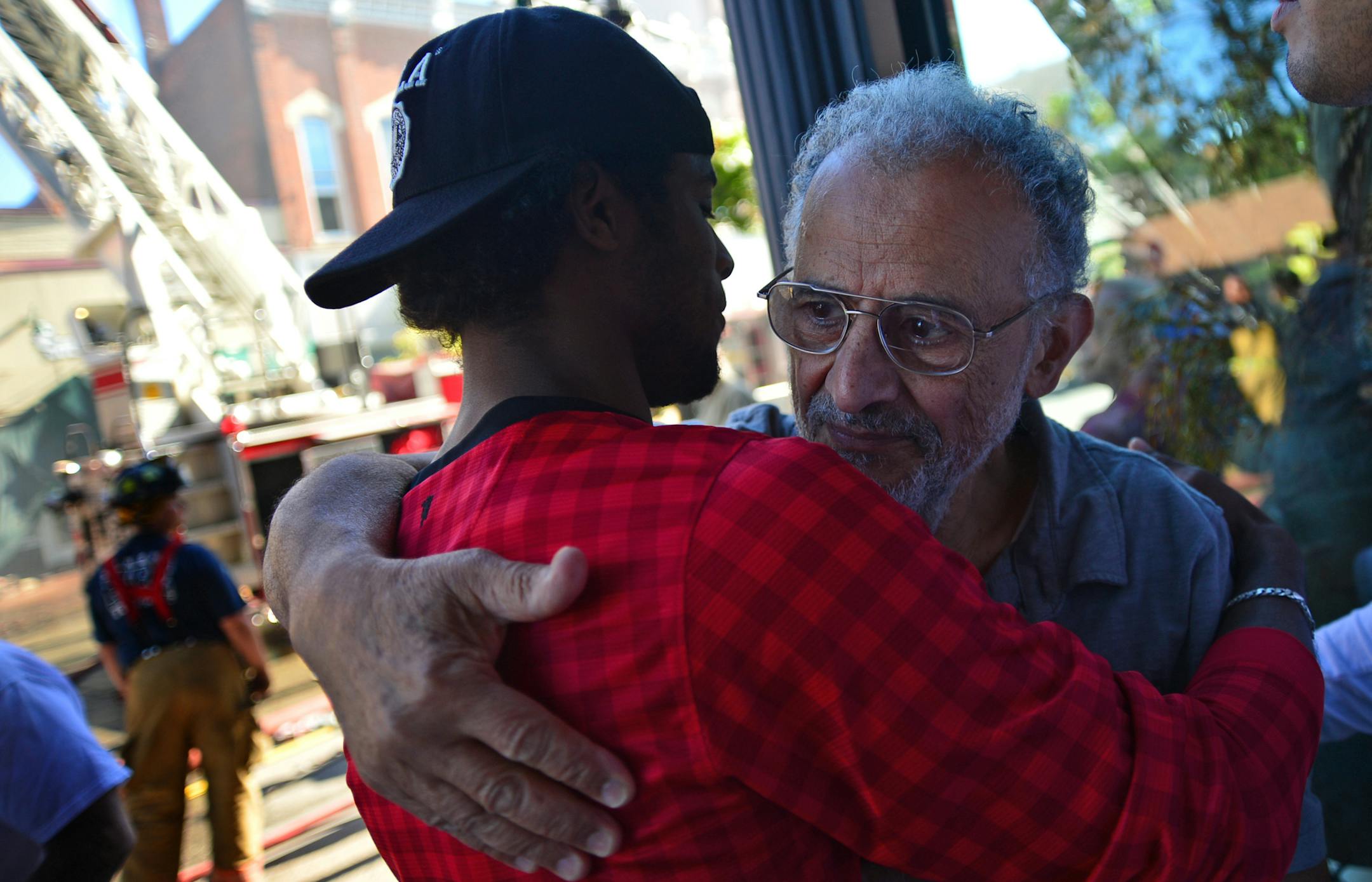 Fire erupted early Friday in downtown Winona, apparently starting in the Islamic Center and spreading through the block. Fire Chief Curt Bittle said the fire had been contained. He said three buildings are a total loss, including the Islamic Center, where the fire burned for some time before it was called in. Ahmed El-Afandi, who started the Islamic Center was embraced at the fire scene by Yousef Hassan who is a center member. ] Richard.Sennott@startribune.com Richard Sennott/Star Tribune Winona
