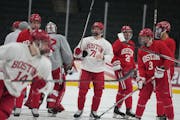 Macklin Celebrini (71) and his Boston University teammates practice Wednesday at Xcel Energy Center, tuning up for Thursday's NCAA semifinal against D