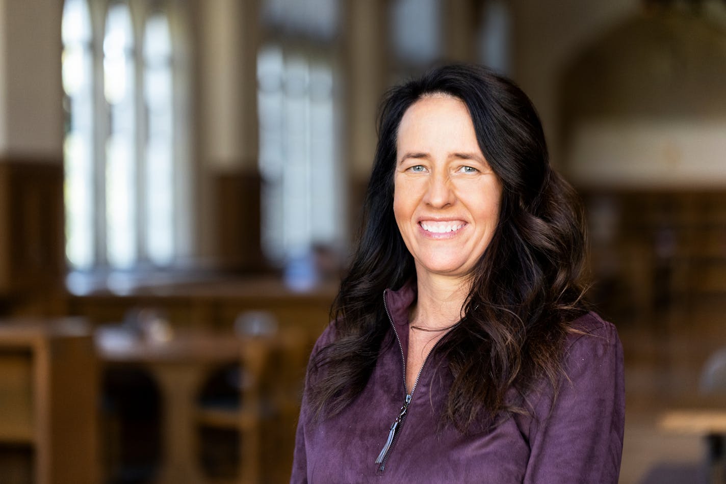 Karen Julian Vice President for Information Technology Services, poses for a portrait in the O'Shaughnessy Frey Library Center on October 18, 2022, in St. Paul.