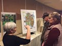 Ginny Yingling, a Minnesota Department of Health hydrogeologist and PFAS authority, talks to local residents at public meeting in Lake Elmo Wednesday 