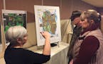 Ginny Yingling, a Minnesota Department of Health hydrogeologist and PFAS authority, talks to local residents at public meeting in Lake Elmo Wednesday 
