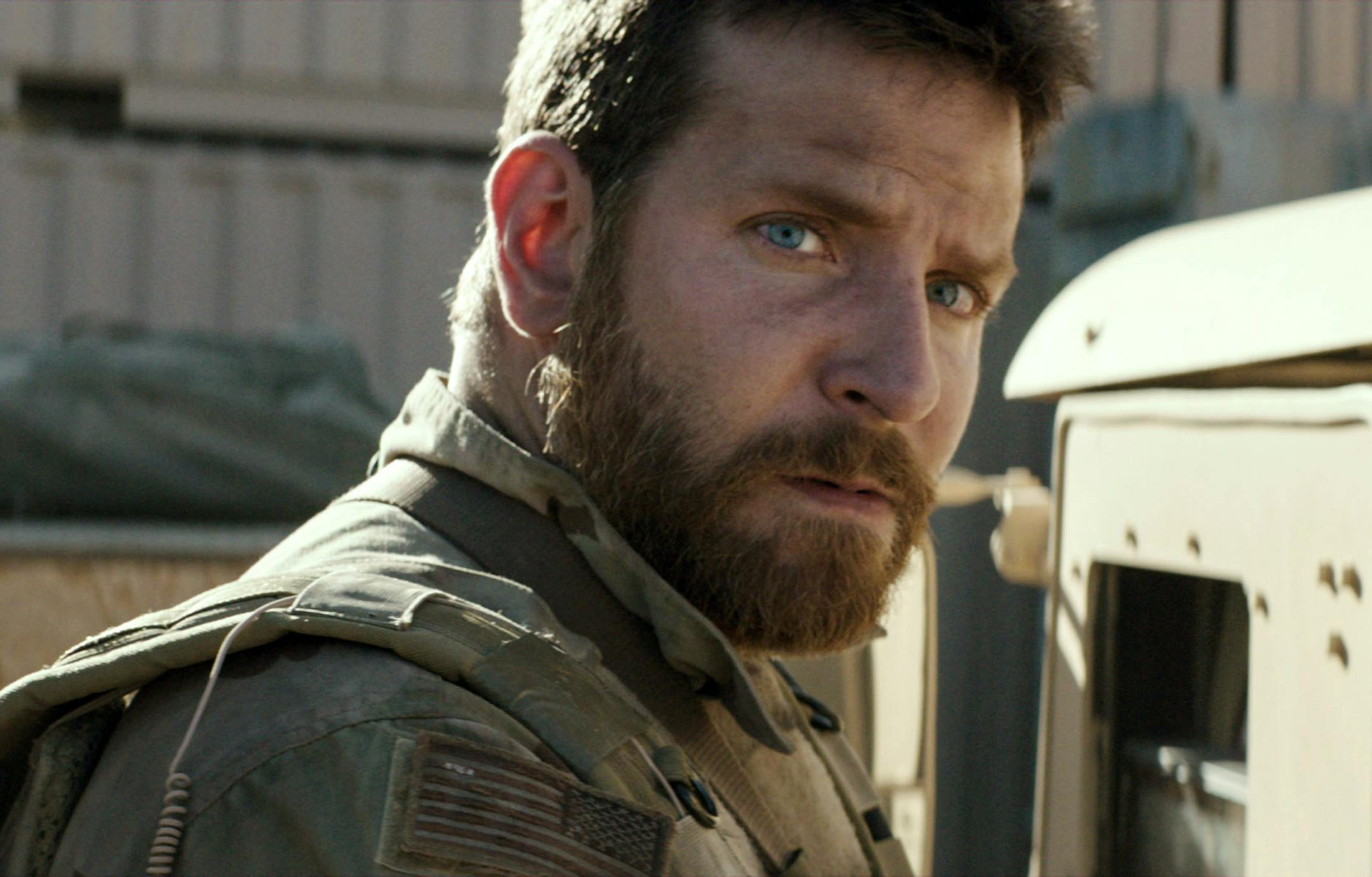 In this image released by Warner Bros. Pictures, Bradley Cooper appears in a scene from "American Sniper." The film was nominated for an Oscar Award for best feature on Thursday, Jan. 15, 2015. The 87th Annual Academy Awards will take place on Sunday, Feb. 22, 2015 at the Dolby Theatre in Los Angeles. (AP Photo/Warner Bros. Pictures) ORG XMIT: NYET404