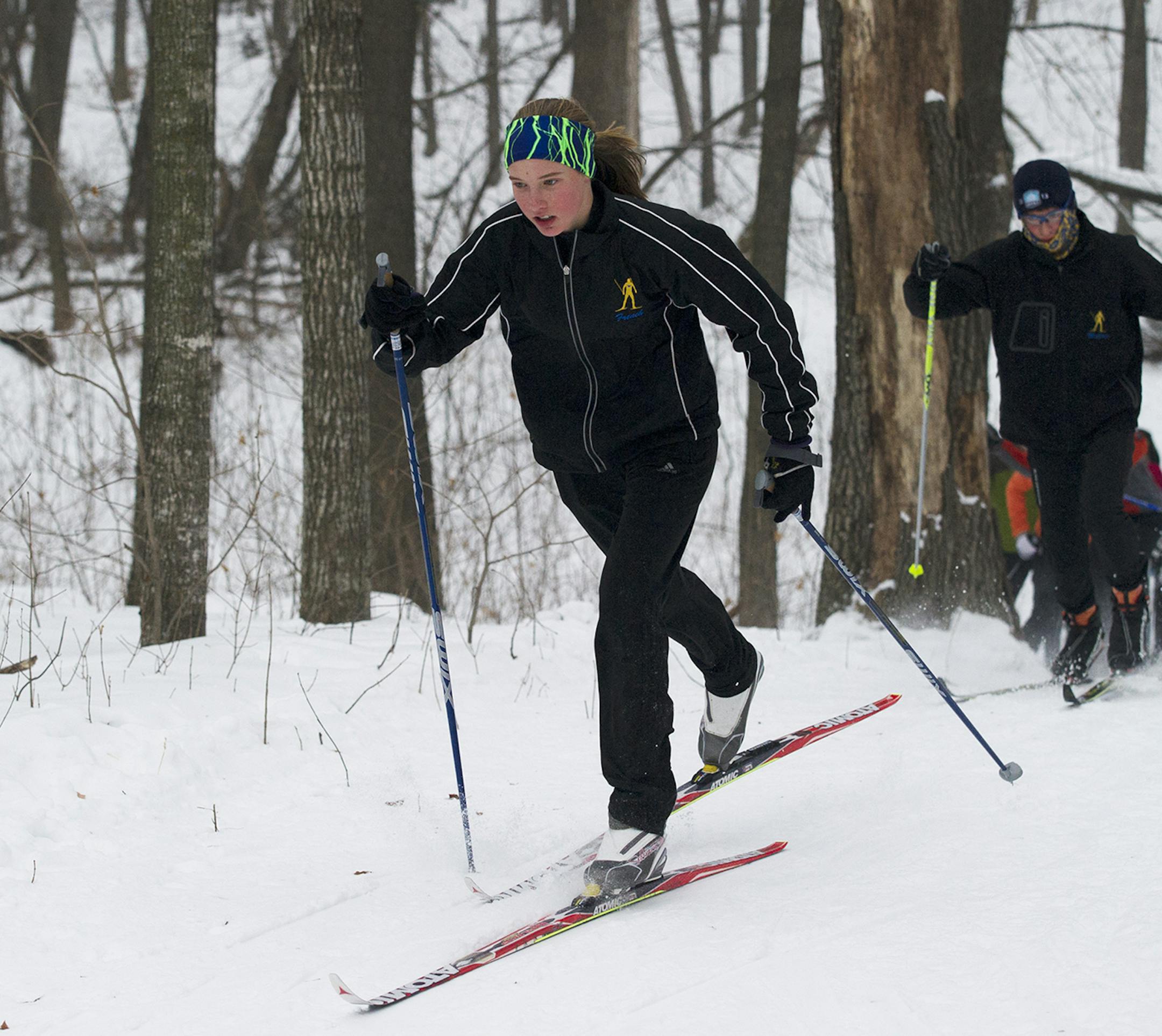 Anna French digs practices with the Wayzata girls cross country ski team Friday afternoon. ](Matthew Hintz, 010414, Wayzata)