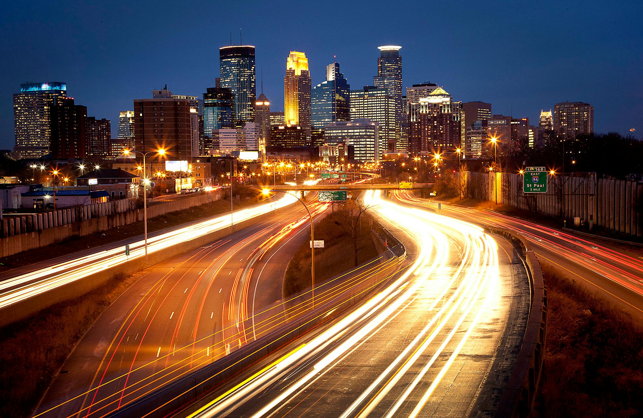 Buildings stand in the skyline of Minneapolis, Minnesota, U.S., on Wednesday, Dec. 28, 2011. The economy in the Minneapolis area grew moderately in 2011, with strong growth in the agriculture, energy, and mining sectors and modest growth in consumer spending, tourism, residential and commercial construction, according to a report by the Federal Reserve Board. Photographer: Ariana Lindquist/Bloomberg