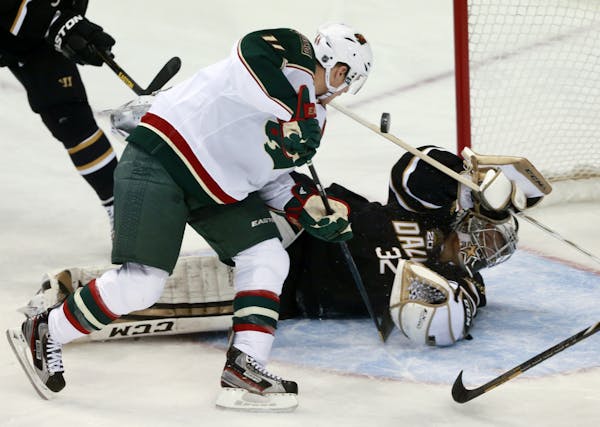 Wild left wing Zach Parise scored against Stars goalie Kari Lehtonen during the first period of the Wild's 7-4 victory Monday.