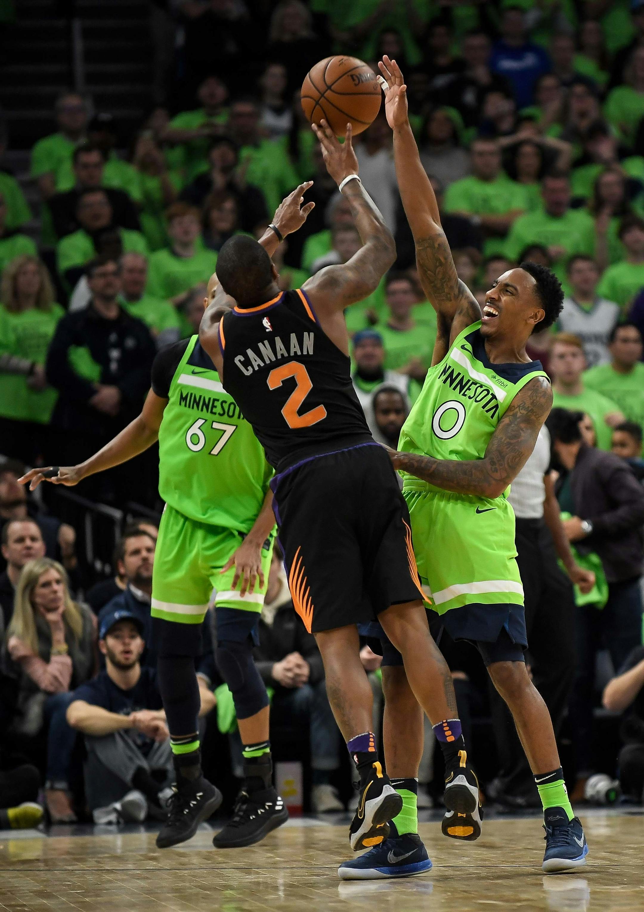 Minnesota Timberwolves guard Jeff Teague (0) fouled Phoenix guard Isaiah Canaan (2) as Canaan attempted a 3-point shot with :06 left in the fourth quarter. Canaan hit all three free throws, giving the Suns a 108-106 lead to close out the game. ] AARON LAVINSKY ï aaron.lavinsky@startribune.com The Minnesota Timberwolves played the Phoenix Suns on Saturday, Dec. 16, 2017 at Target Center in Minneapolis, Minn.