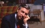 This image released by Focus Features shows Fred Rogers on the set of his show "Mr. Rogers Neighborhood" from the film, "Won't You Be My Neighbor." (J
