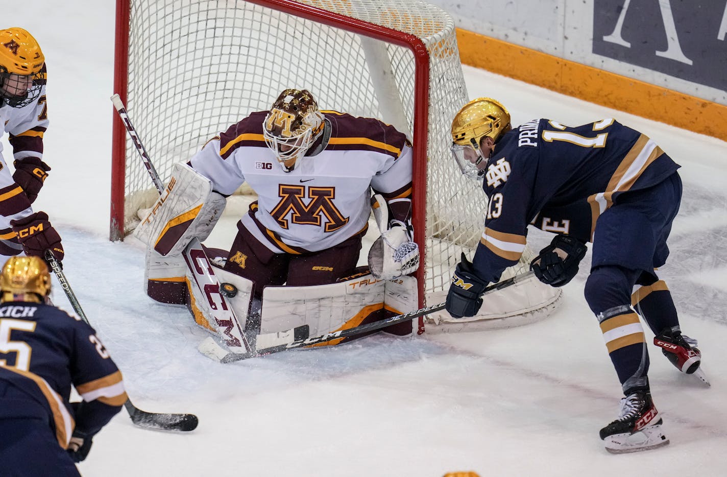 Notre Dame forward Chayse Primeau (13) can't get past Minnesota goaltender Justen Close (1) in the first period. The Minnesota Gophers hosted the Notre Dame Fighting Irish at 3M Arena at Mariucci on Friday, Nov. 4, 2022 in Minneapolis, Minn. ] RENEE JONES SCHNEIDER • renee.jones@startribune.com