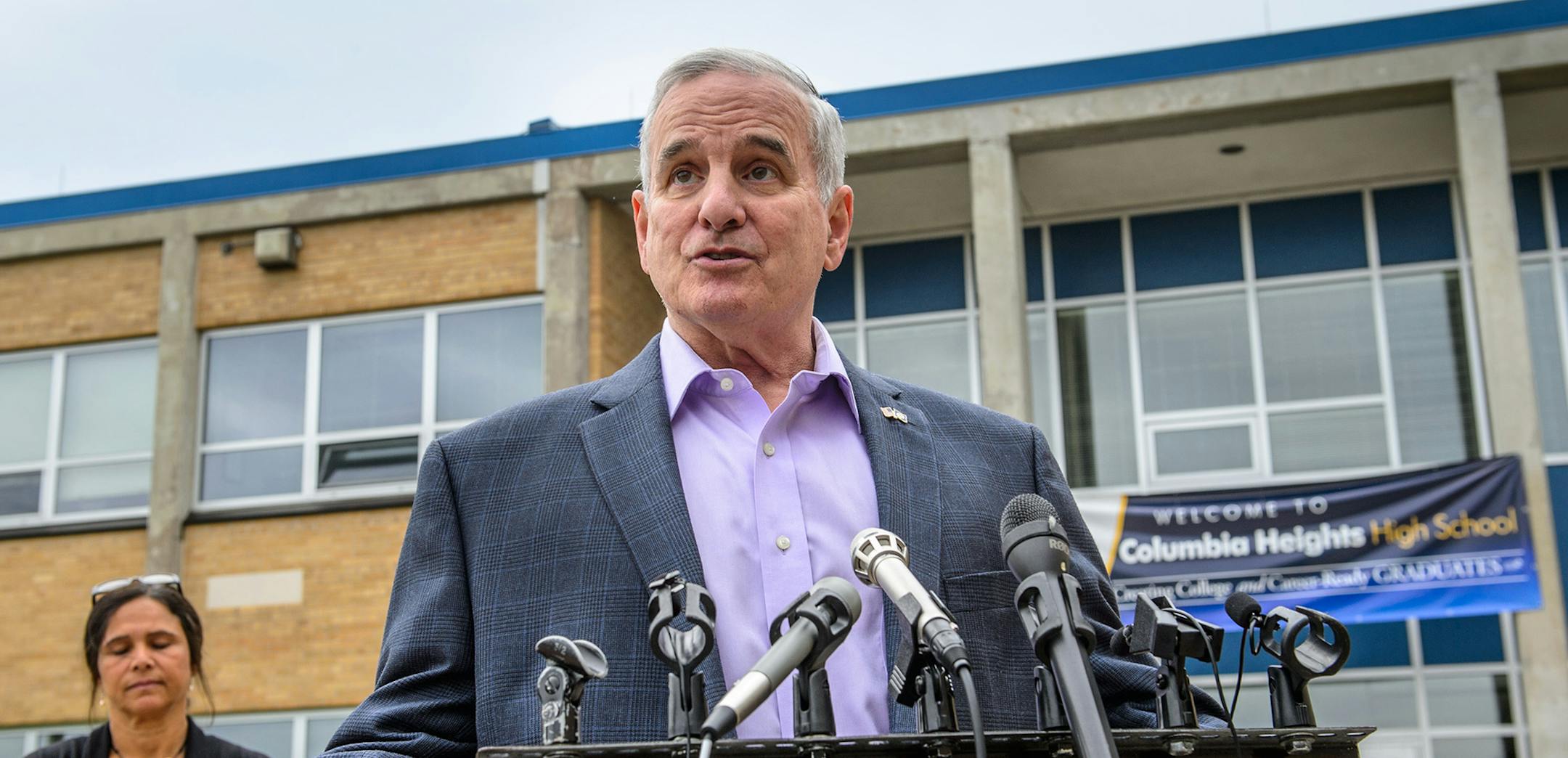 Governor Dayton spoke to the media after meeting inside with students. On the left is Education Commissioner Brenda Cassellius. Columbia Heights School Superintendant Kathy Kelly refused to allow media inside to hear the Governor. ] GLEN STUBBE * gstubbe@startribune.com Friday September 18, 2015 Gov. Mark Dayton spoke to students at Columbia Heights High School, coming days after a school board member nearly lost his seat for allegedly making anti-Muslim remarks online.Dayton said he was proud o