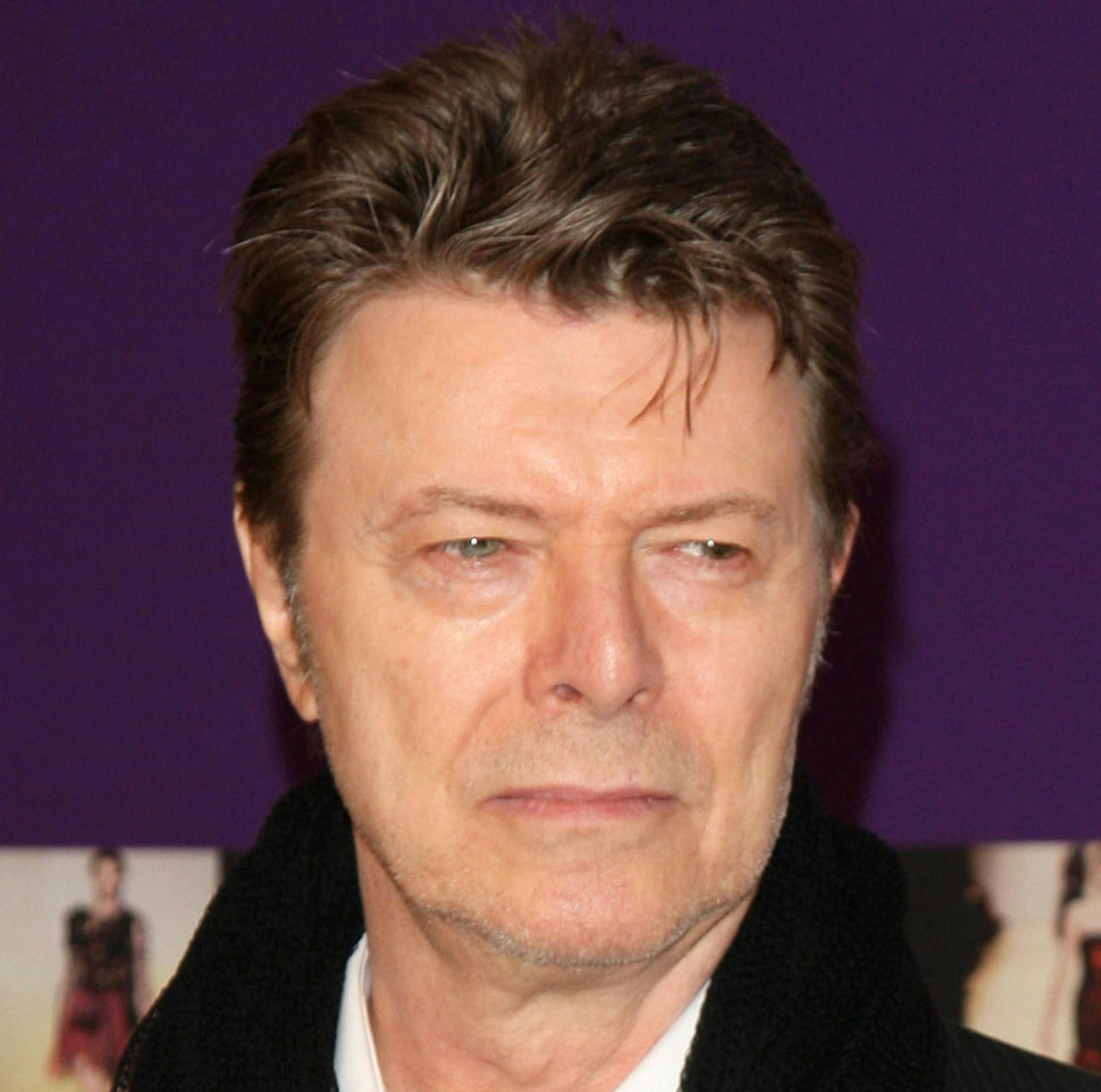 FILE - In this June 7, 2010 file photo, David Bowie attends the 2010 CFDA Fashion Awards in New York. Bowie, the innovative and iconic singer whose illustrious career lasted five decades, died Monday, Jan. 11, 2015, after battling cancer for 18 months. He was 69. (AP Photo/Peter Kramer, File)