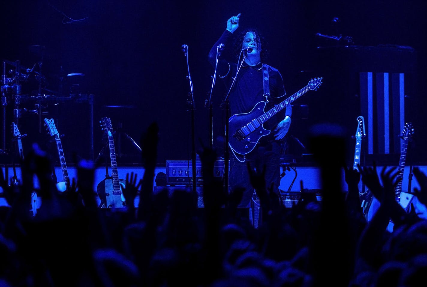 Jack White sings for thousands of screaming and adoring fans. ] ALEX KORMANN &#x2022; alex.kormann@startribune.com Jack White, formerly a member of the rock duo, White Stripes, performed for a sold out crowd at the Armory on Monday night. As per his policy to enhance fan experience, all in attendance had to lock their phones away in cases until the end of the concert. The crowd, however, did not miss them for even a moment as he rocked the venue.