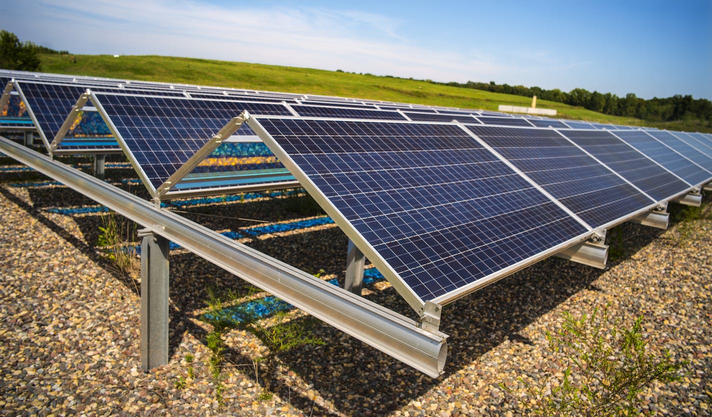 Solar panels help power 80% of the needs of the landfill in burning off excess methane emissions. Walker Smith of the Minnesota Pollution Control Agency, which has converted several capped landfills into sites for solar arrays, is visiting its array near Lake Elmo.] Richard Tsong-Taatarii &#xef; richard.tsong-taatarii@startribune.com