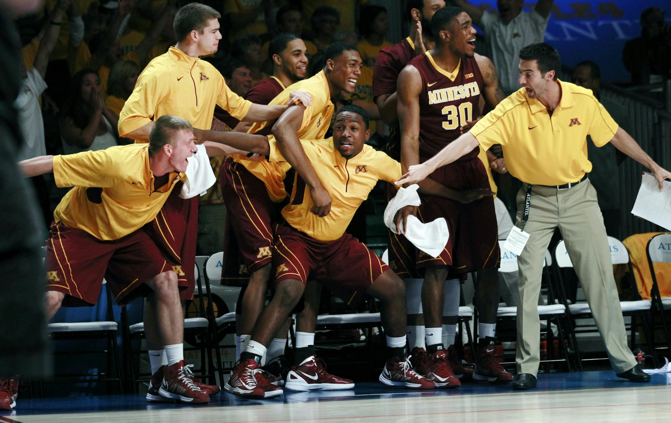 The Gophers reacted in the final seconds of their victory over Stanford in the Battle 4 Atlantis basketball tournament in November 2012 in the Bahamas.